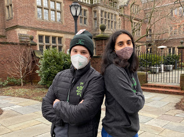 2 students wearing JE apparel