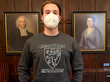 The front of the JE Crest Crewneck