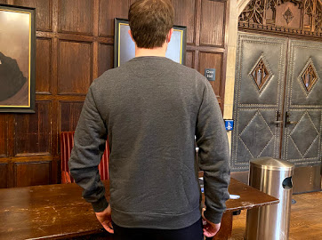 The back of the JE Crest Crewneck