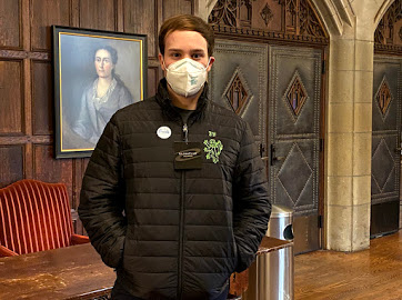 Student wears JE Puffer Jacket