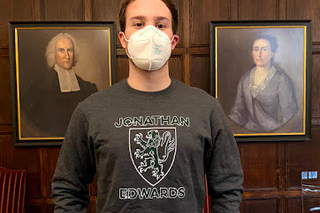 The front of the JE Crest Crewneck